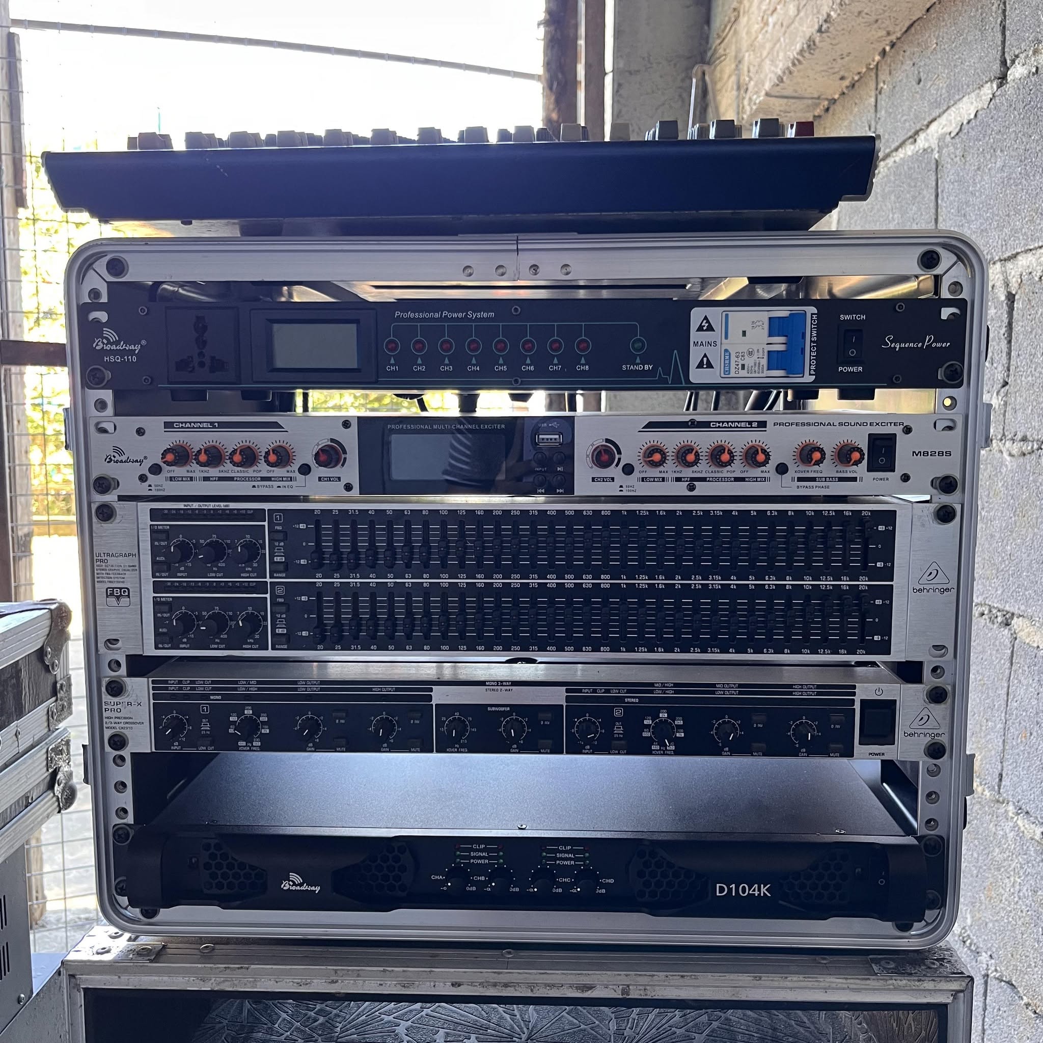 Rack of professional signal processors, equalizers and power amplifier
